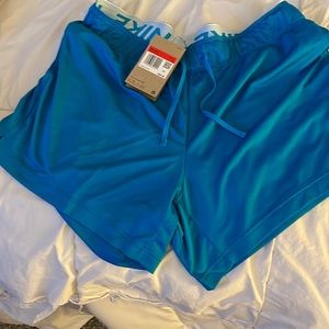 Nike womens short eye catching bright blue.
